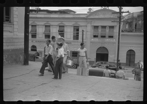 San Juan, Puerto Rico. People carrying water home because of the failure of the water system in San Juan for three days