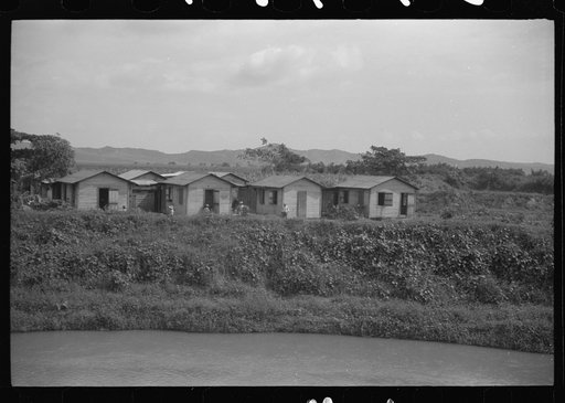 Untitled photo, possibly related to: Yabucoa, Puerto Rico. Homes of sugar mill workers near the mill