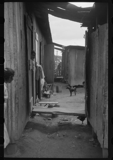 Untitled photo, possibly related to: Yabucoa, Puerto Rico. In the mill village at the sugar mill