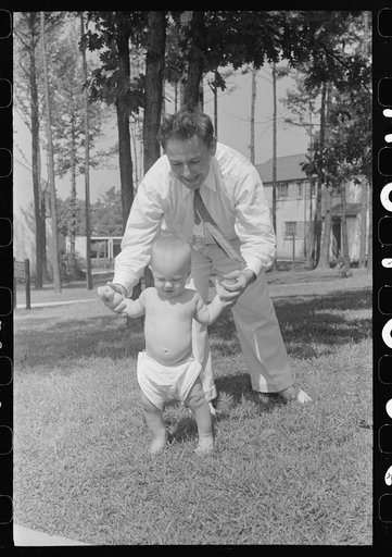 Untitled photo, possibly related to: Father and son at Greenbelt, Maryland