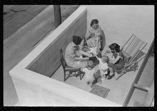 Untitled photo, possibly related to: Family on terrace in Greenbelt, Maryland