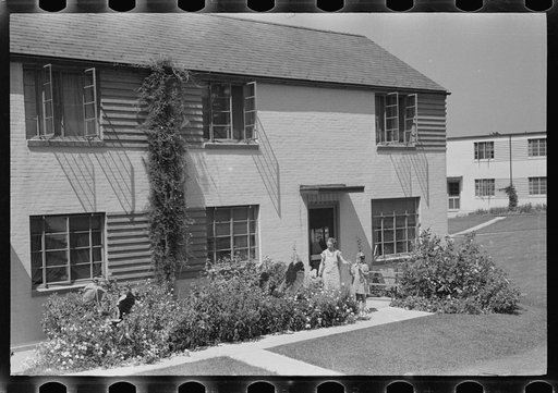 Untitled photo, possibly related to: Greenbelt, Maryland. Homes with flowers