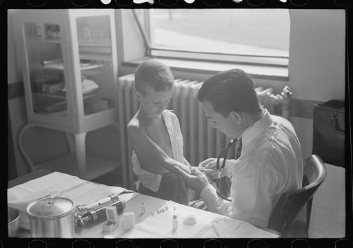 Untitled photo, possibly related to: Doctor examining child at Greenbelt in preschool clinic, Maryland