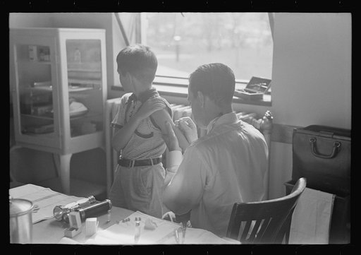 Untitled photo, possibly related to: Doctor examining child at Greenbelt in preschool clinic, Maryland