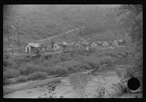Untitled photo, possibly related to: Abandoned mining community. At present almost everyone on relief. Marine, West Virginia