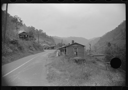 Untitled photo, possibly related to: Abandoned mining community. At present almost everyone on relief. Marine, West Virginia