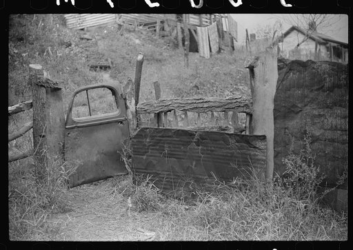Fence gate in coal miner's front yard, Mohegan, West Virginia