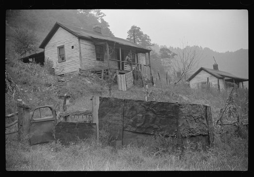 Untitled photo, possibly related to: Fence gate in coal miner's front yard, Mohegan, West Virginia