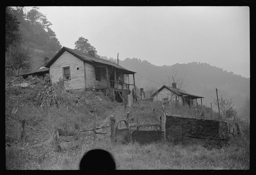 Untitled photo, possibly related to: Fence gate in coal miner's front yard, Mohegan, West Virginia