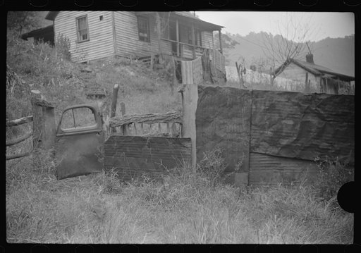Untitled photo, possibly related to: Fence gate in coal miner's front yard, Mohegan, West Virginia