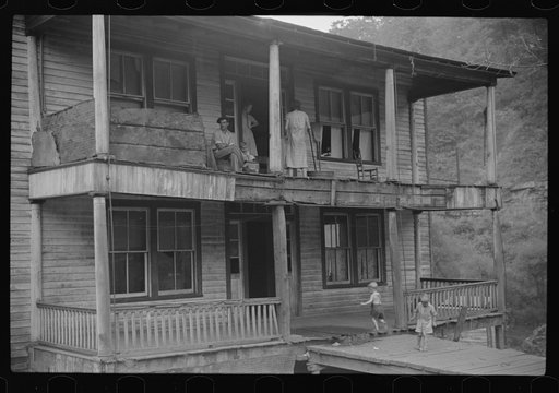 Former miners' boardinghouse now inhabited by seven families, almost all on relief in abandoned mining town, Mohegan, West Virginia