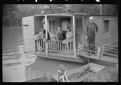 Family living on riverboat, Charleston, West Virginia. Husband now on WPA (Works Progress Administration) labor