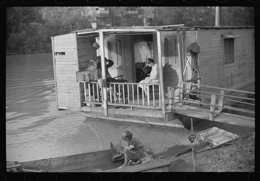 Untitled photo, possibly related to: Family living on riverboat, Charleston, West Virginia. Husband now on WPA (Works Progress Administration) labor