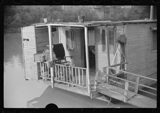 Untitled photo, possibly related to: Family living on riverboat, Charleston, West Virginia. Husband now on WPA (Works Progress Administration) labor