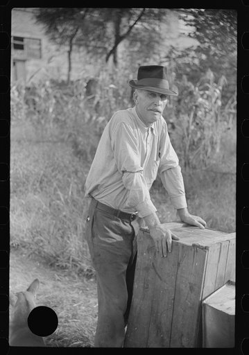 Untitled photo, possibly related to: Man living in shack by river, Charleston, West Virginia