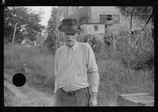 Untitled photo, possibly related to: Man living in shack by river, Charleston, West Virginia