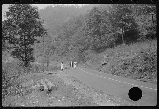 Untitled photo, possibly related to: Miners' wives coming home from town with groceries on payday near Mohegan, West Virginia