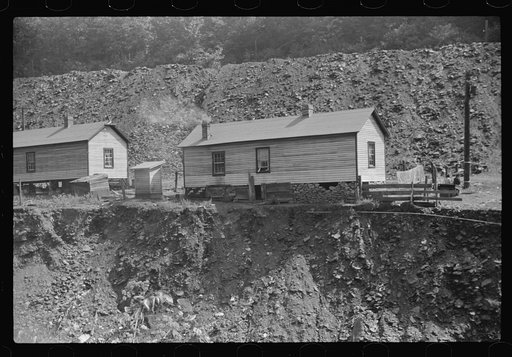 Coal miners' homes by slate and slag heap, Caples, West Virginia