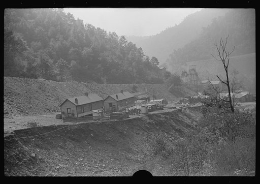Untitled photo, possibly related to: Coal miners' homes by slate and slag heap, Caples, West Virginia