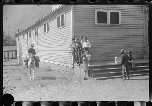 Untitled photo, possibly related to: Miner taking home provisions, Caples, West Virginia