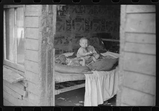 Children in bedroom of their home. Mother has TB, father is on WPA (Works Progress Administration), Charleston, West Virginia