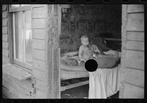 Untitled photo, possibly related to: Children in bedroom of their home. Mother has TB, father is on WPA (Works Progress Administration), Charleston, West Virginia