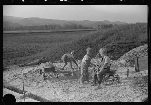 Untitled photo, possibly related to: Homesteaders' children playing in pile of sand, Tygart Valley, West Virginia