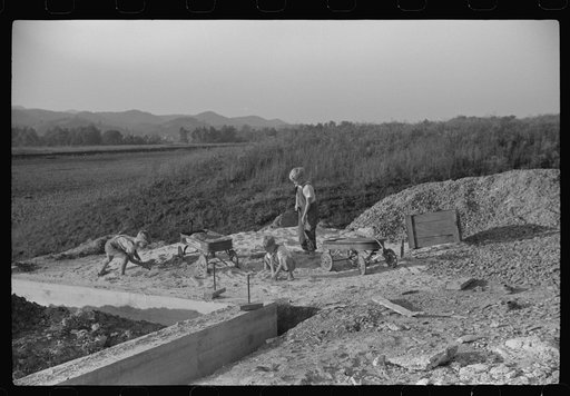 Untitled photo, possibly related to: Homesteaders' children playing in pile of sand, Tygart Valley, West Virginia
