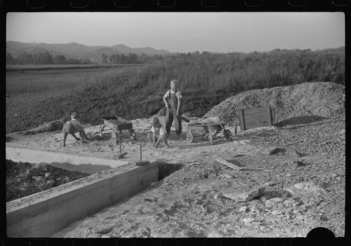 Untitled photo, possibly related to: Homesteaders' children playing in pile of sand, Tygart Valley, West Virginia