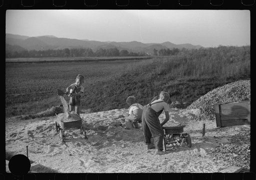 Untitled photo, possibly related to: Homesteaders' children playing in pile of sand, Tygart Valley, West Virginia
