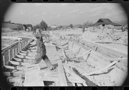 Untitled photo, possibly related to: Construction work on new community building, Tygart Valley Homesteads, West Virginia