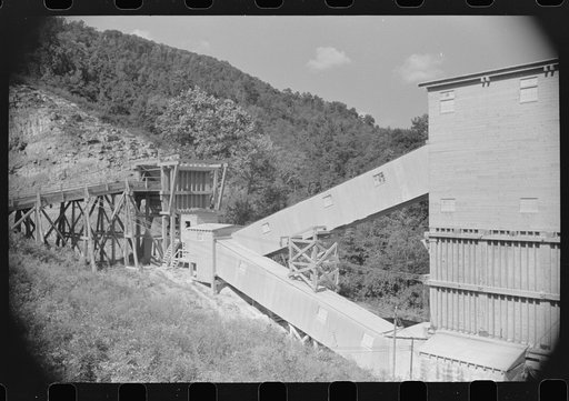 Rock crusher at quarry. Tygart Valley, West Virginia