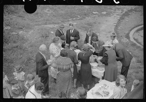 Untitled photo, possibly related to: Sunday school picnic. Much of the food brought into abandoned mining town of Jere, West Virginia by "neighboring folk" from other parishes. There is a great deal of "hard feelings" and many fights between Catholics and Protestants. Miners as a whole are not very 