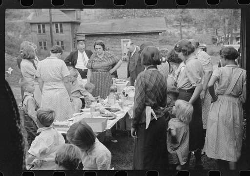 Prayer, or grace, at Sunday school picnic in abandoned mining town of Jere, West Virginia