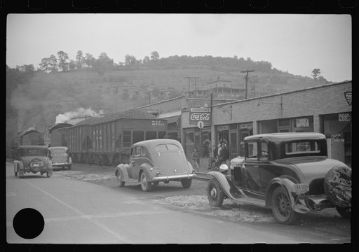 Untitled photo, possibly related to: Train pulling coal through center of town morning and evenings, Osage, West Virginia
