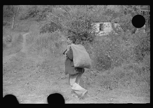 Untitled photo, possibly related to: Mexican miner and child, Bertha Hill, West Virginia. Many Mexicans and Negroes were brought into Scotts Run around 1926 to break the strike. Now about one fourth of all mines employ any at all and these, only very small percent and "only the cream." They are gene