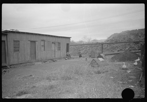 Untitled photo, possibly related to: Section of Rosedale Mining Compnay. Shanties by the river. Scotts Run, West Virginia