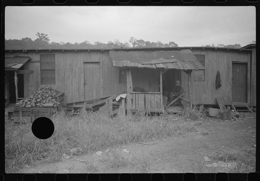 Untitled photo, possibly related to: Section of Rosedale Mining Compnay. Shanties by the river. Scotts Run, West Virginia