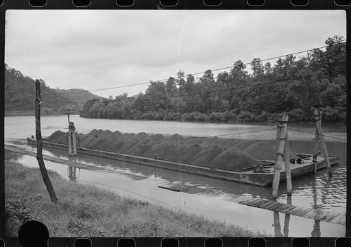 Untitled photo, possibly related to: Coal barge on river, Scotts Run, West Virginia