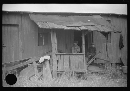 Untitled photo, possibly related to: Former miners (note crutches). Scotts Run, West Virginia
