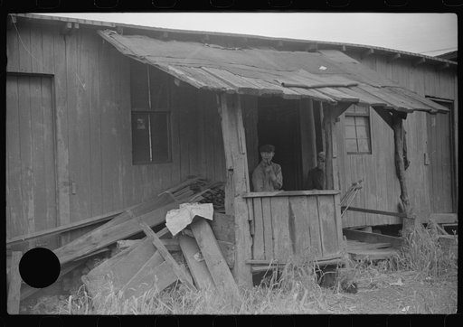 Untitled photo, possibly related to: Former miners (note crutches). Scotts Run, West Virginia