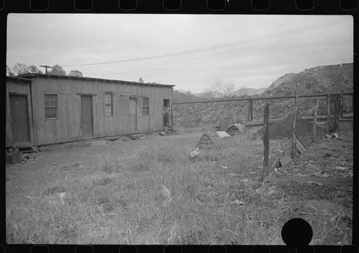 Untitled photo, possibly related to: Section of Rosedale Mining Compnay. Shanties by the river. Scotts Run, West Virginia
