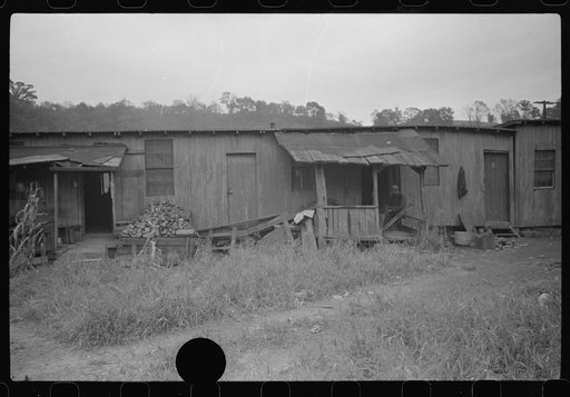 Untitled photo, possibly related to: Section of Rosedale Mining Compnay. Shanties by the river. Scotts Run, West Virginia