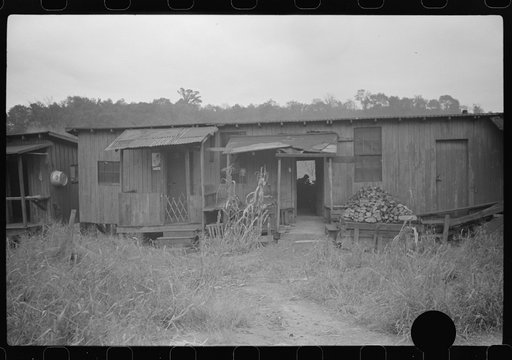 Untitled photo, possibly related to: Section of Rosedale Mining Compnay. Shanties by the river. Scotts Run, West Virginia