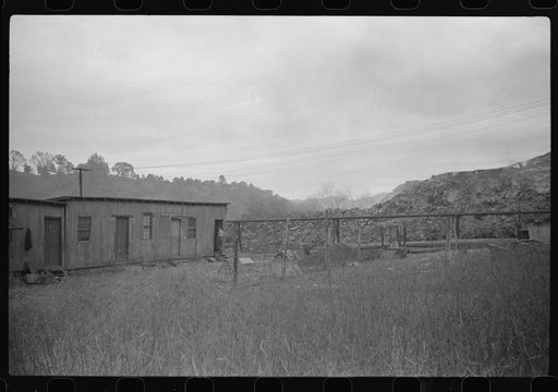 Untitled photo, possibly related to: Section of Rosedale Mining Compnay. Shanties by the river. Scotts Run, West Virginia