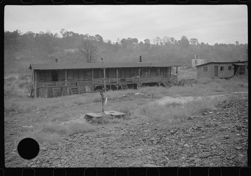Untitled photo, possibly related to: Coal miners' shanties by the river, West Virginia