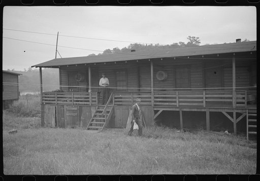 Coal miners' shanties by the river. Scotts Run, West Virginia