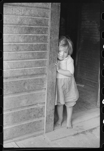 Mexican miner's child in doorway of home, Bertha Hill, West Virginia