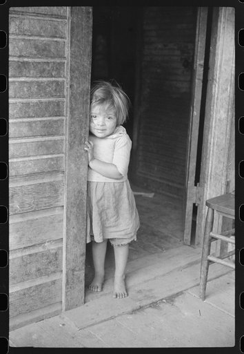 Untitled photo, possibly related to: Mexican miner's child in doorway of home, Bertha Hill, West Virginia