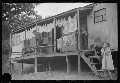 Untitled photo, possibly related to: Coal miner's shack and some of his family, Pursglove, West Virginia